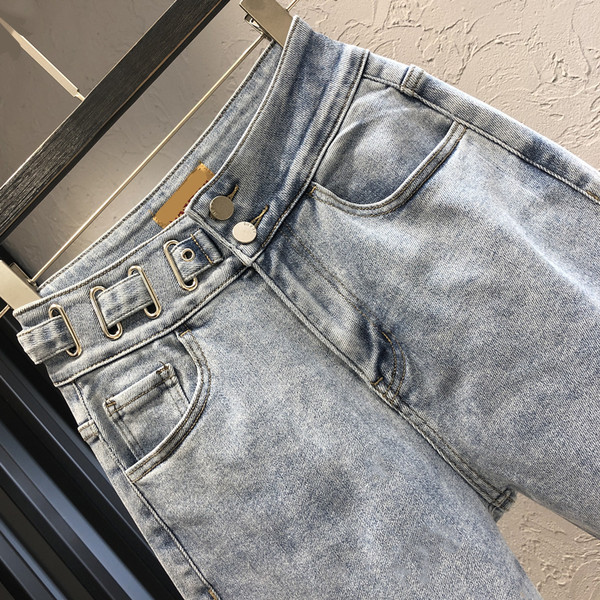 Sieviešu moderni džinsi ar augstu vidukli - zilā krāsā