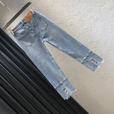 Γυναικεία μοντέρνα τζιν με κουμπιά και ψηλή μέση σε μπλε χρώμα