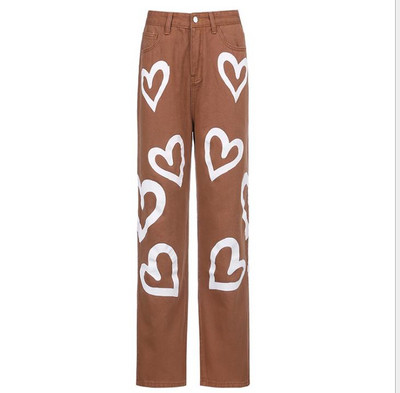 Blugi de dama cu picioare late si inimioare aplicate