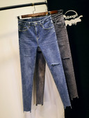 Jauns sieviešu elastīgo džinsu modelis ar saplēstiem motīviem