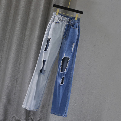 Sieviešu džinsi ar saplēstu labo - plats modelis