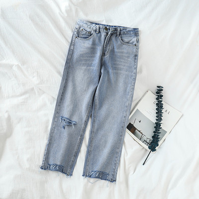 Blugi moderni cu buzunare și motive rupte