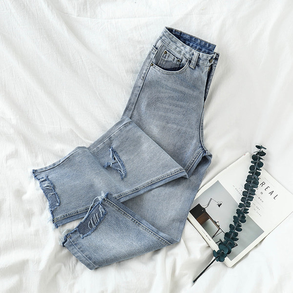 Blugi moderni cu buzunare și motive rupte