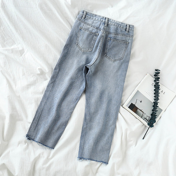 Blugi moderni cu buzunare și motive rupte