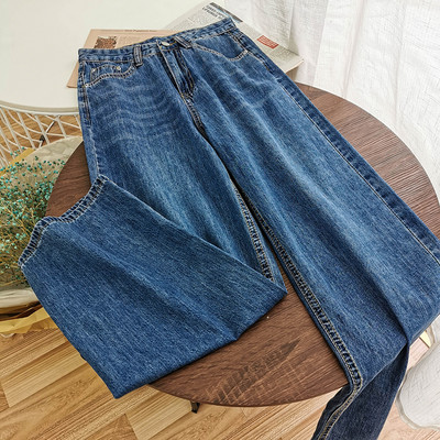 Sieviešu džinsu retro modelis ar augstu vidukli un kabatām