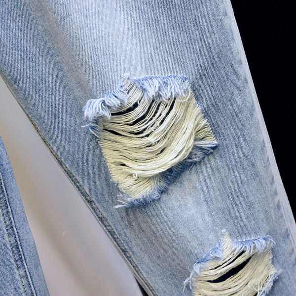 Model nou de blugi de dama cu motive rupte in albastru