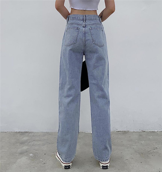 Model larg de blugi de dama cu inchidere asimetrica