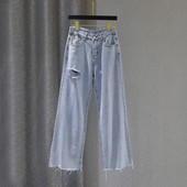 Sieviešu džinsa bikses ar saplēstu elementu un augstu vidukli