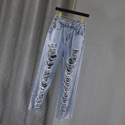 Γυναικεία τζιν με σκισμένα μοτίβα και τσέπες