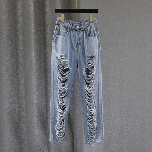 Γυναικεία τζιν με σκισμένα μοτίβα και τσέπες