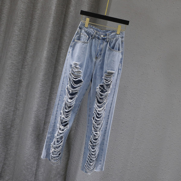 Γυναικεία τζιν με σκισμένα μοτίβα και τσέπες