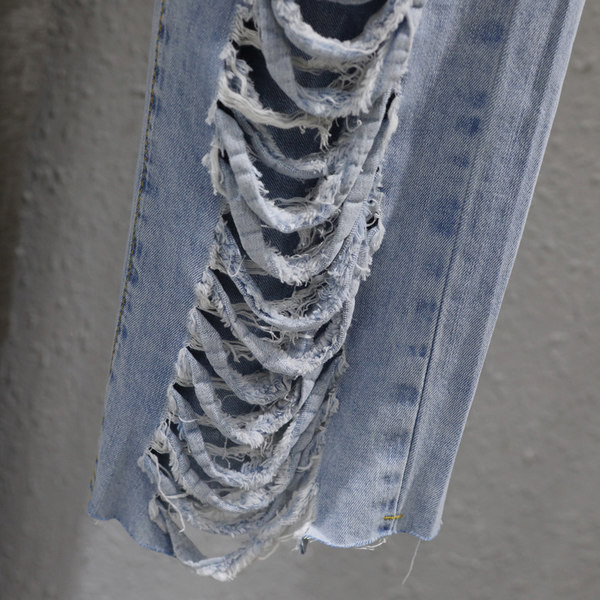 Γυναικεία τζιν με σκισμένα μοτίβα και τσέπες