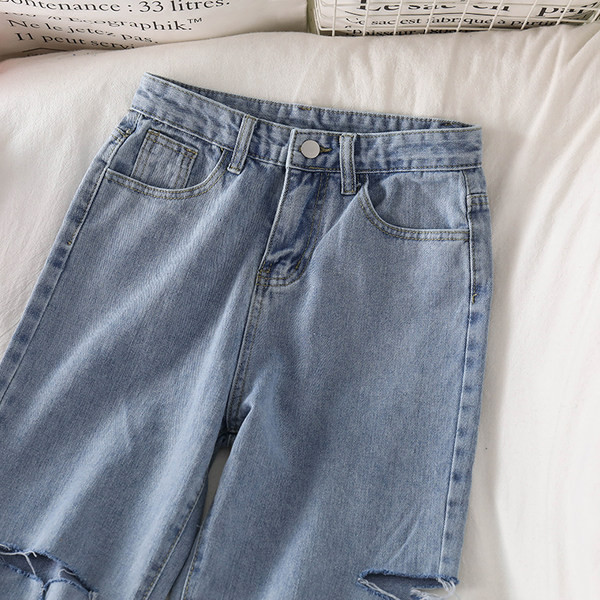 Γυναικεία τζιν με σκισμένα μοτίβα και ψηλή μέση 