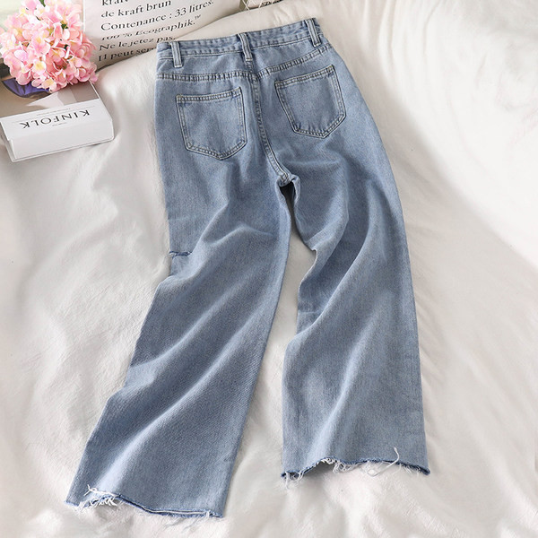 Γυναικεία τζιν με σκισμένα μοτίβα και ψηλή μέση 