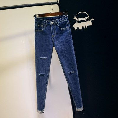 Jauns sieviešu piegulošu džinsu modelis ar saplēstiem motīviem - zilā krāsā