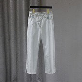 Sieviešu ikdienas džinsi ar šķēlumiem zilā krāsā