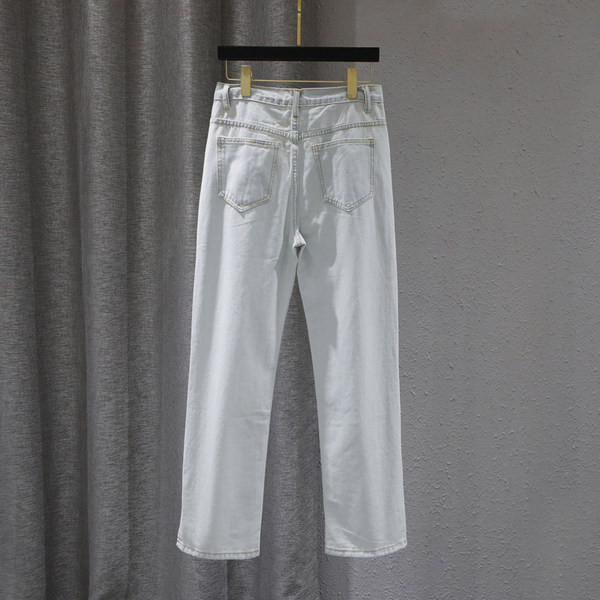 Sieviešu ikdienas džinsi ar šķēlumiem zilā krāsā