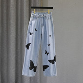 Sieviešu ikdienas džinsi ar aplikāciju un augstu vidukli