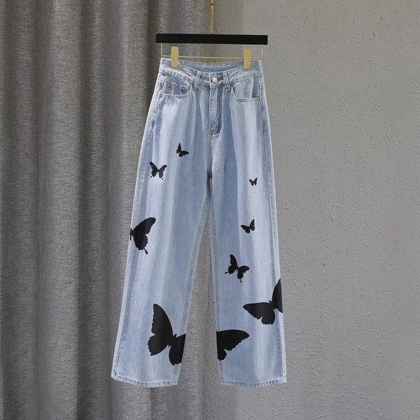 Sieviešu ikdienas džinsi ar aplikāciju un augstu vidukli