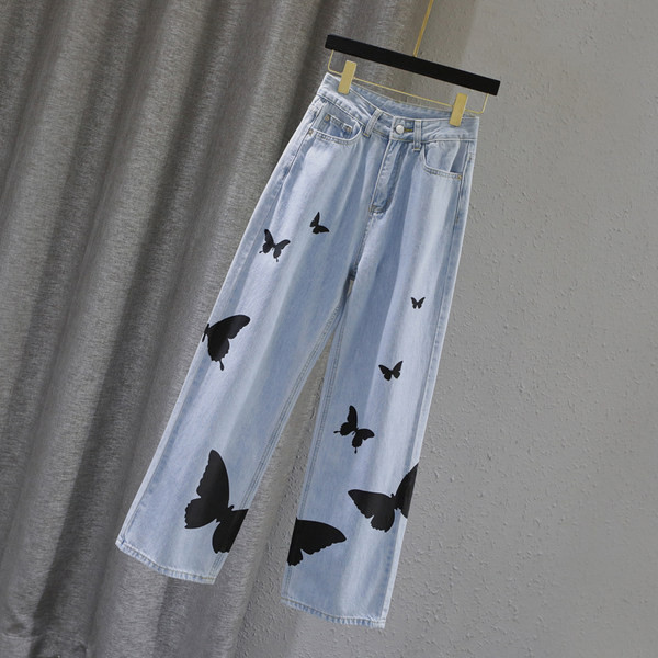 Sieviešu ikdienas džinsi ar aplikāciju un augstu vidukli