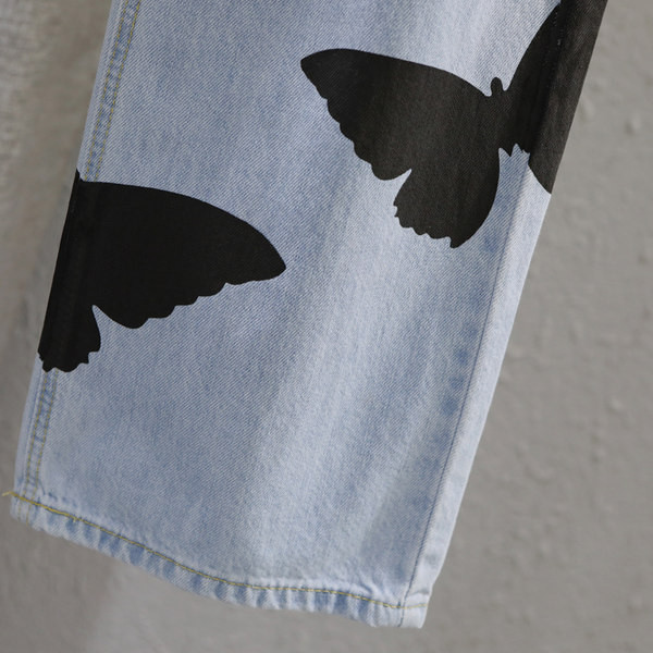 Sieviešu ikdienas džinsi ar aplikāciju un augstu vidukli