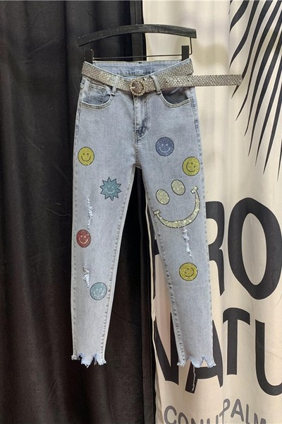 Blugi de dama cu aplicatii si motive rupte