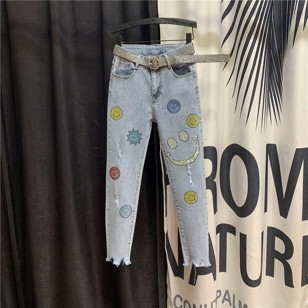 Blugi de dama cu aplicatii si motive rupte