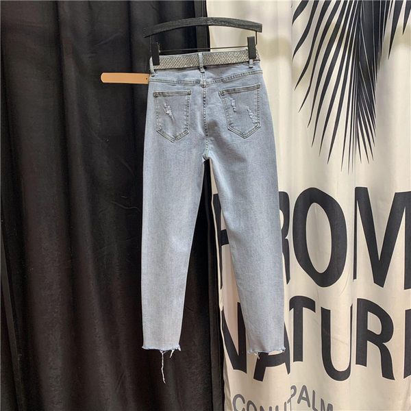 Blugi de dama cu aplicatii si motive rupte