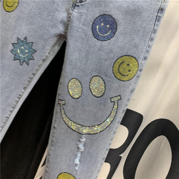 Blugi de dama cu aplicatii si motive rupte