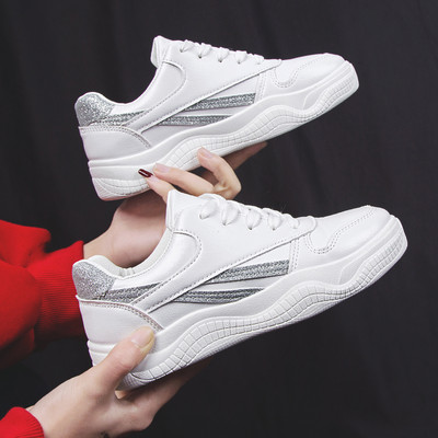 Sieviešu kedas baltas ar spīdīgiem elementiem