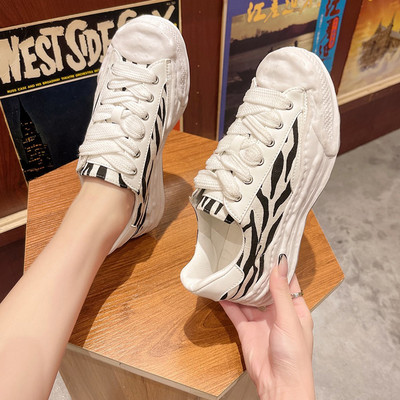 Sieviešu kedas baltā un brūnā krāsā