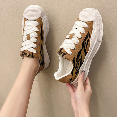 Sieviešu kedas baltā un brūnā krāsā