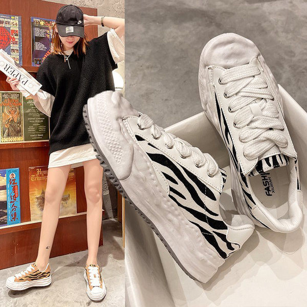 Sieviešu kedas baltā un brūnā krāsā