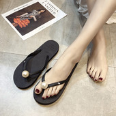 Flip flops ar gumijas zoli un pērļu rotājumu