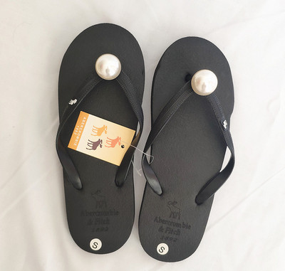 Flip flops ar gumijas zoli un pērļu rotājumu