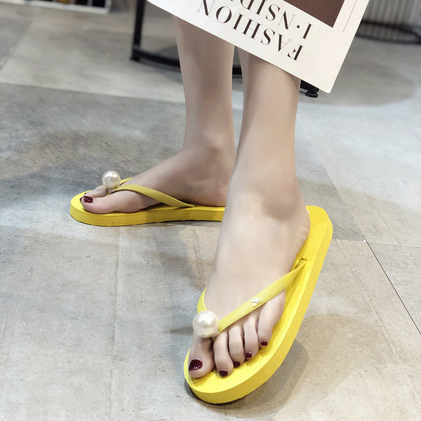 Flip flops ar gumijas zoli un pērļu rotājumu