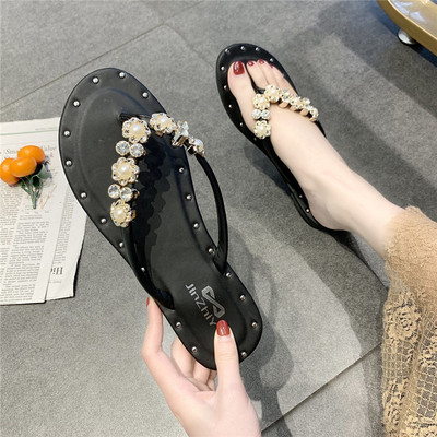 Sieviešu ikdienas čības ar plakanu zoli un pērļu rotājumu