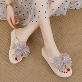 Παντόφλες μοντέρνες γυναικείες με κορδέλα και επίπεδη σόλα