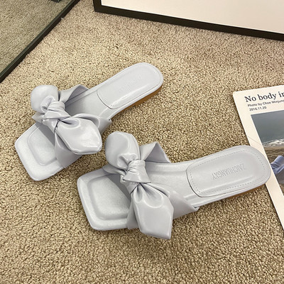 Papuci de dama din imitatie de piele cu panglica