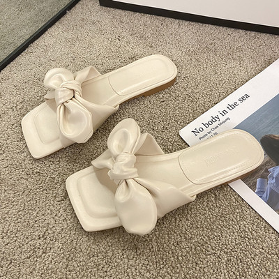 Papuci de dama din imitatie de piele cu panglica