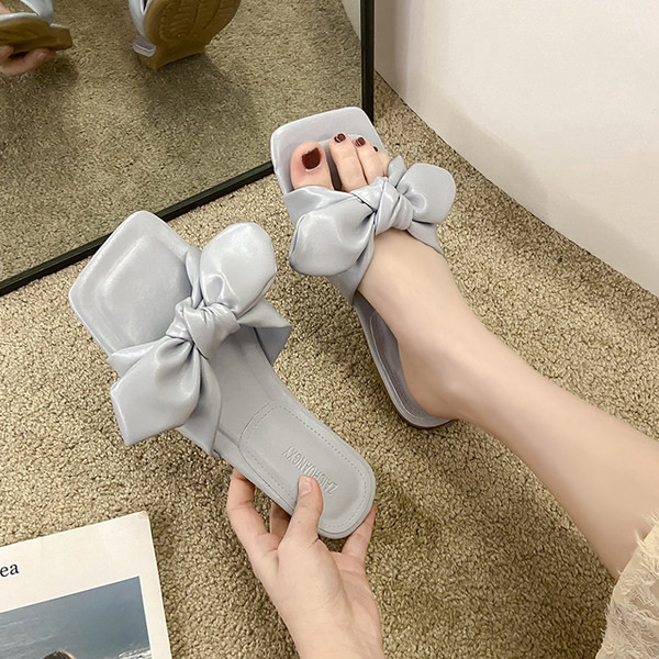 Papuci de dama din imitatie de piele cu panglica