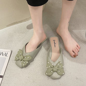 Naiste kinnised paela ja pärlitega sussid