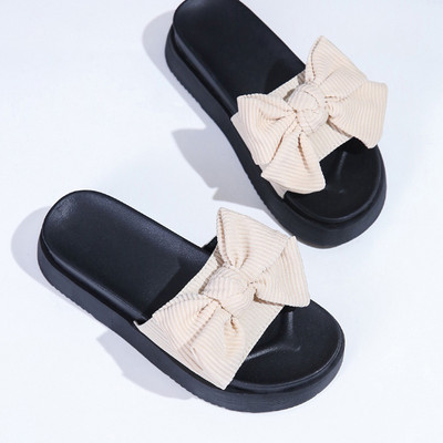 Παντόφλες με πλατφόρμα και λουράκι με κορδέλα