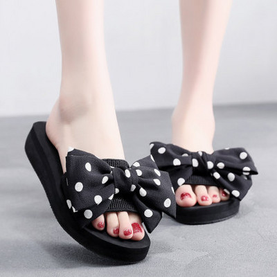 Γυναικείες παντόφλες με υψηλή πλατφόρμα και κορδέλα δύο μοντέλα