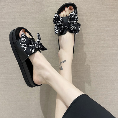 Sieviešu ikdienas čības ar lenti un plakanu zoli