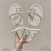 Γυναικείες παντόφλες με επίπεδη σόλα και πέρλες