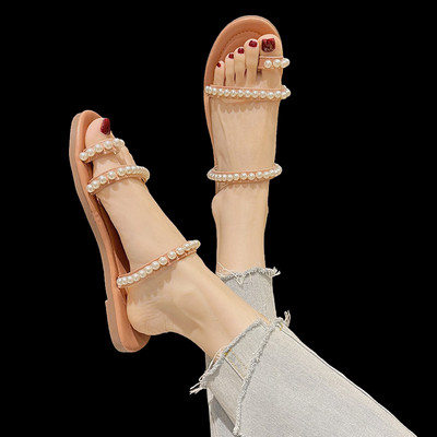 Γυναικείες παντόφλες με επίπεδη σόλα και πέρλες