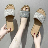 Papuci de damă cu talpă plată și particule strălucitoare