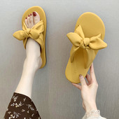 Model nou de papuci din piele si panglica