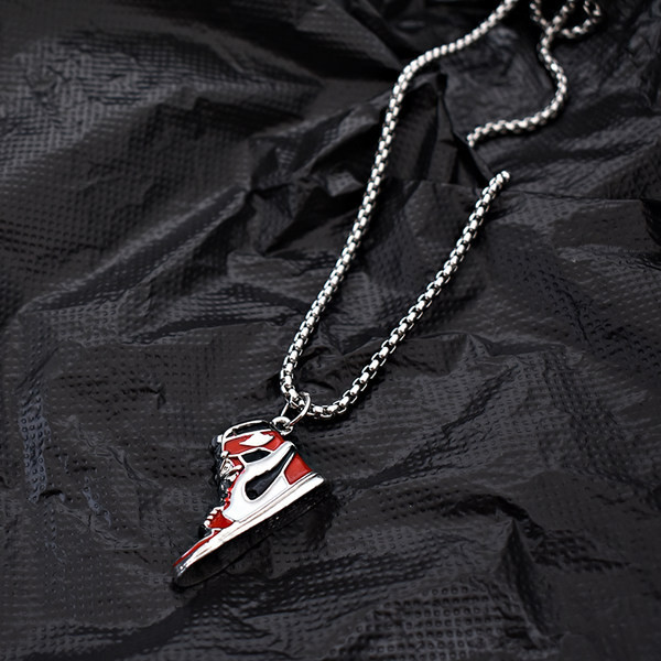 Moderna vīriešu ķēde ar apavu kulonu